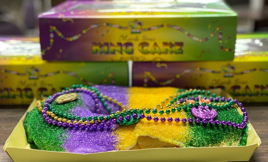 Lemon king cake with smooth citrus filling, classic icing, and festive sugar on soft brioche dough